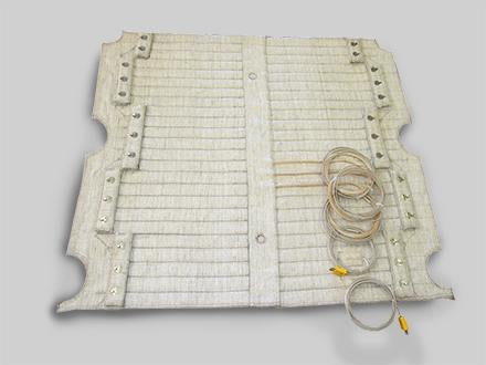 A flat heating blanket with an insulated outer fabric.