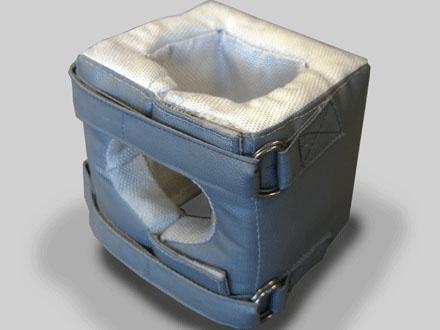 A removable insulator jacket for heat retention.